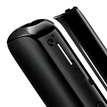 Prim-plan capac frontal Ploom AURA Jet Black, detașat de dispozitiv.
