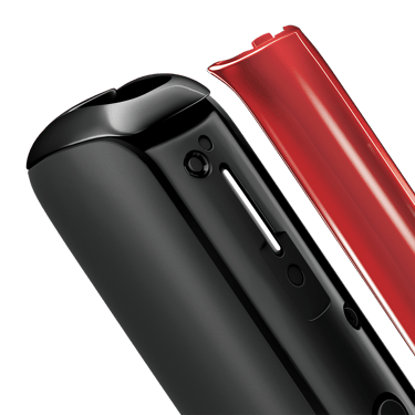 Prim-plan capac frontal Ploom AURA în culoarea Lava Red, detașat de dispozitiv.
